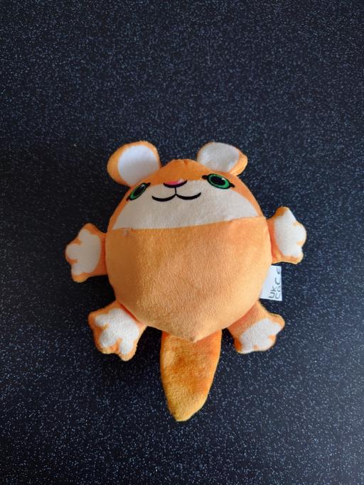  — Orange animal soft toy