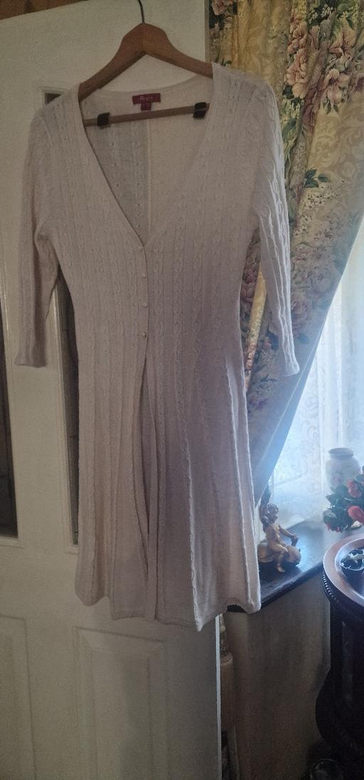  — cardigan