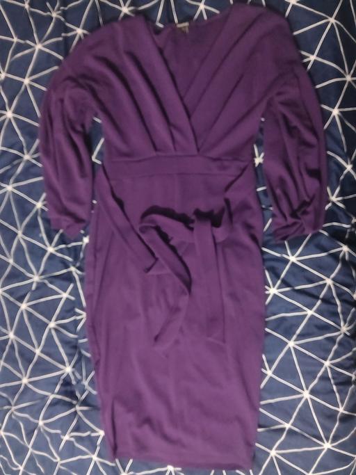  — purple dress