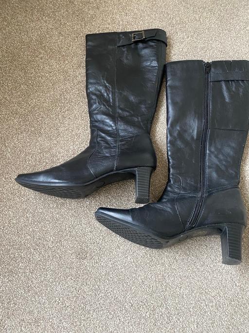  — Knee high leather boots