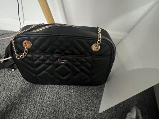  — Next bag in gold