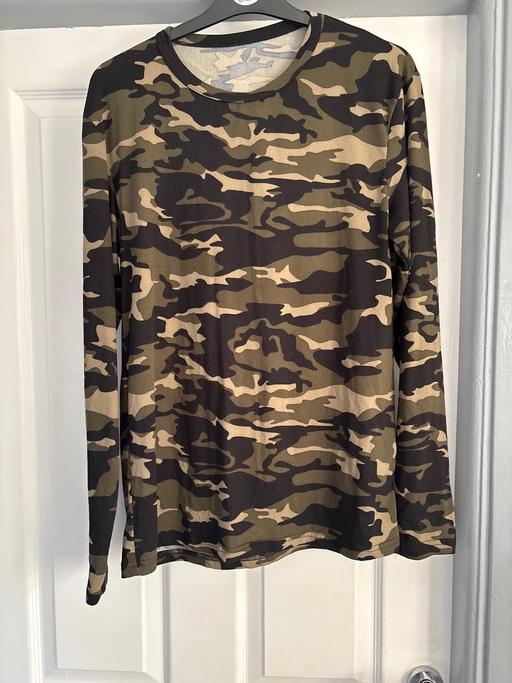  — Men’s top