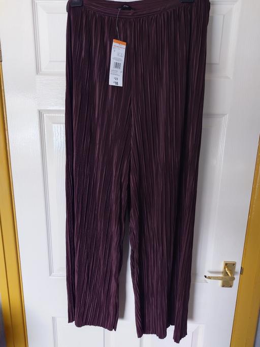 — Women's brown trousers size 16