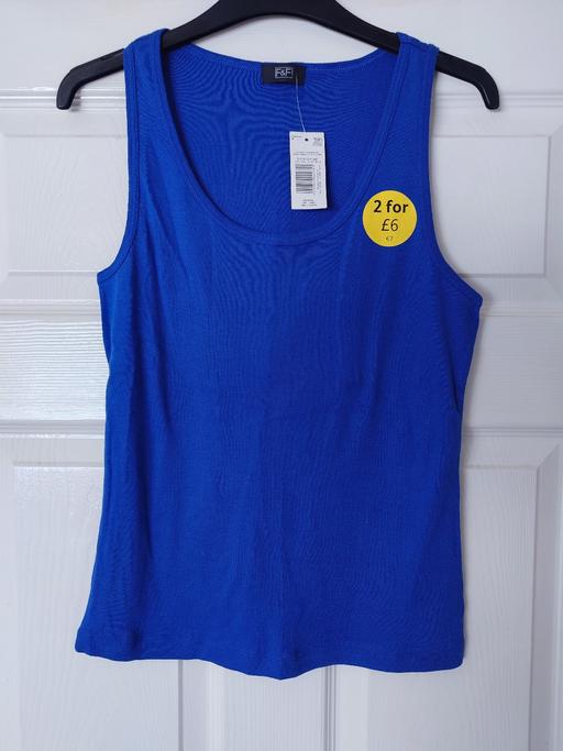  — Women's blue vest top size 14