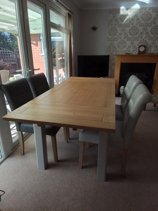  — New dining table and 4 chairs