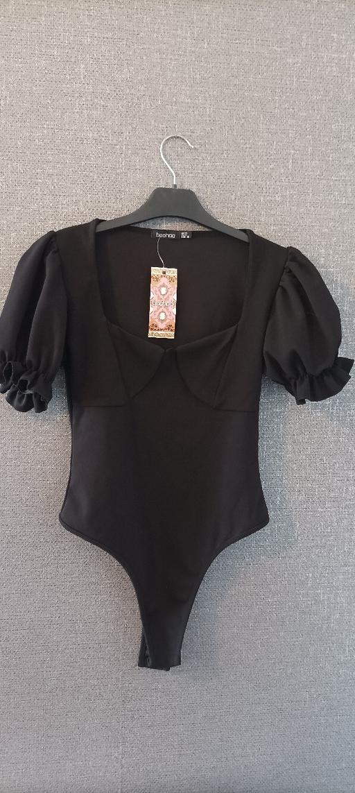  — black bodysuit