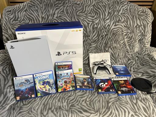  — PlayStation 5 with 8 games