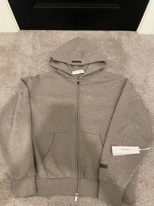  — Essentials fear of god zip hoodie