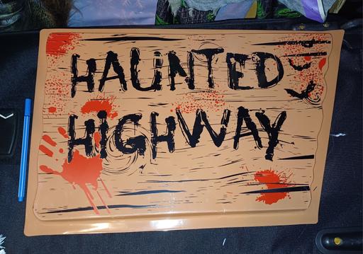  — haunted house sign. new