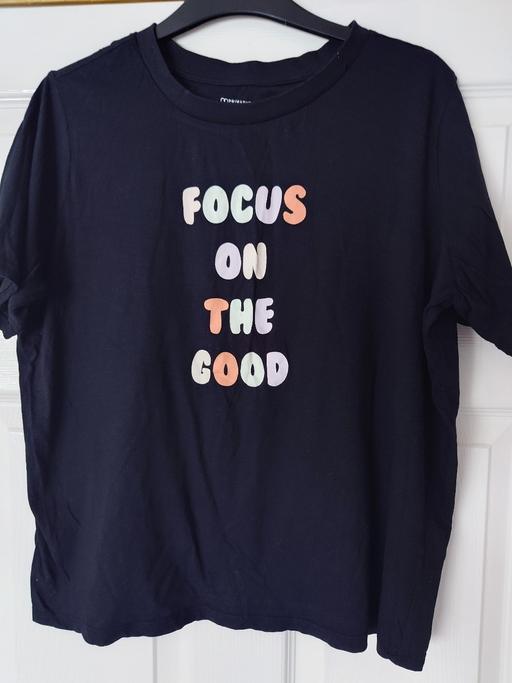  — Women's black t-shirt size 14/16