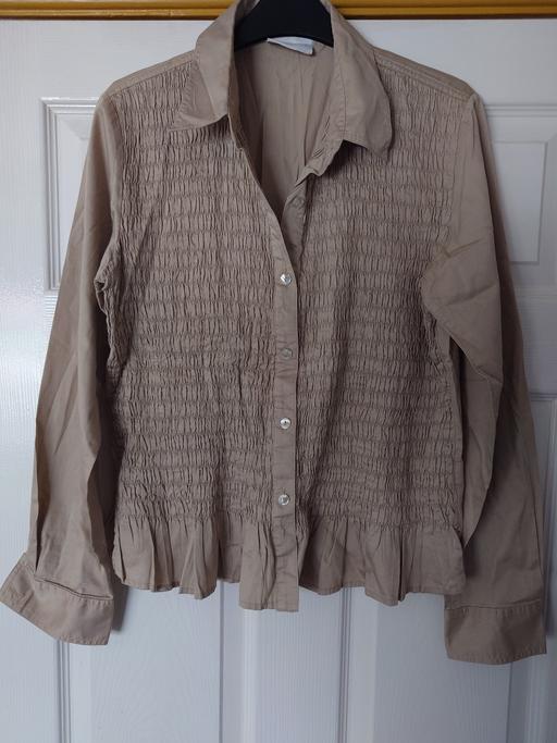  — Women's ruffle blouse size M