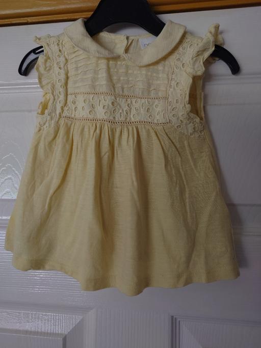  — Baby girls yellow top size 6-9 months