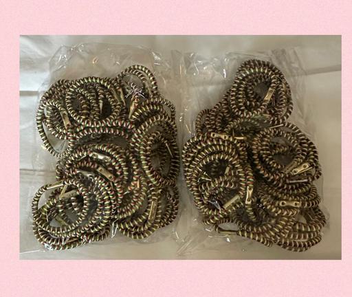  — 100 hair bobbles