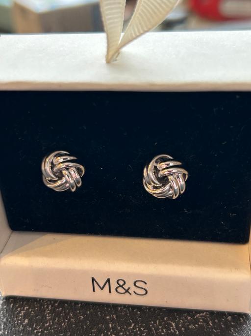  — M&S cuff links. New in box. Knot design.