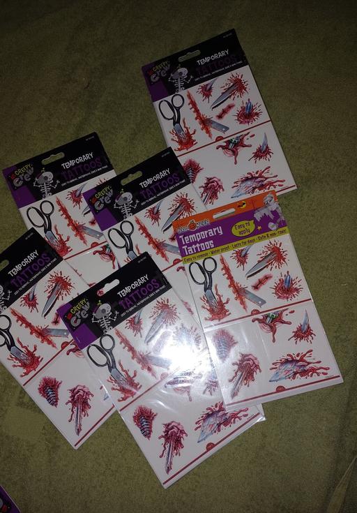  — temporary tattoos. new