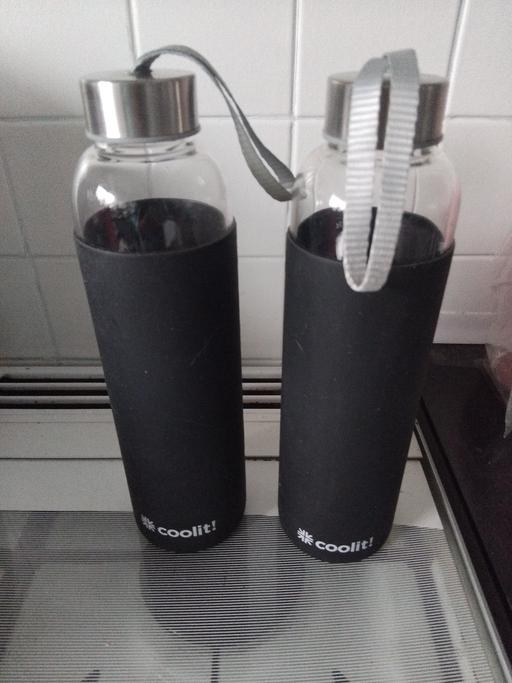  — Glass drinks bottles