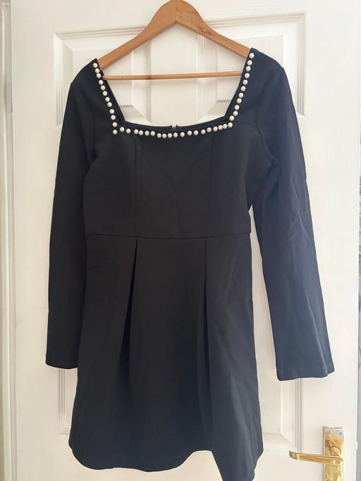  — Ladies dress fits size 12