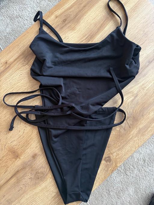  — Backless swimsuit PLT