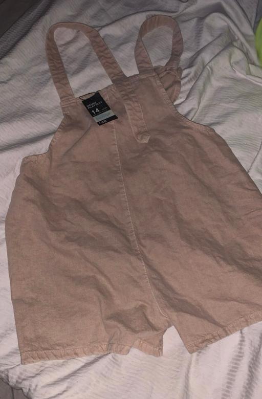  — woman's dungarees