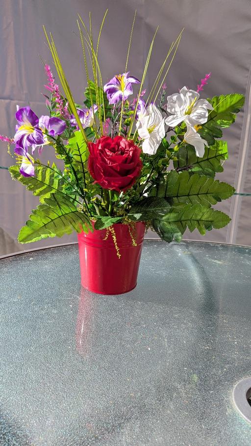  — artificial flowers