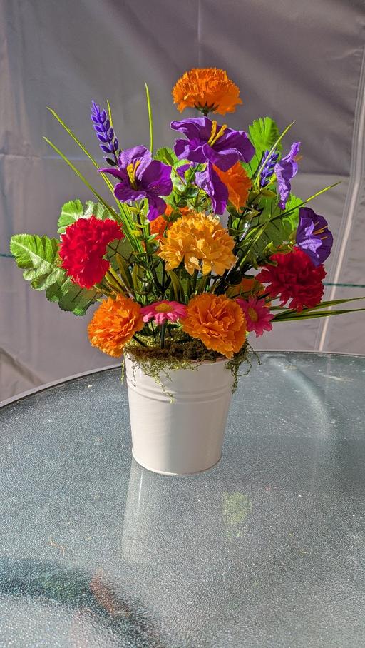  — artificial flowers
