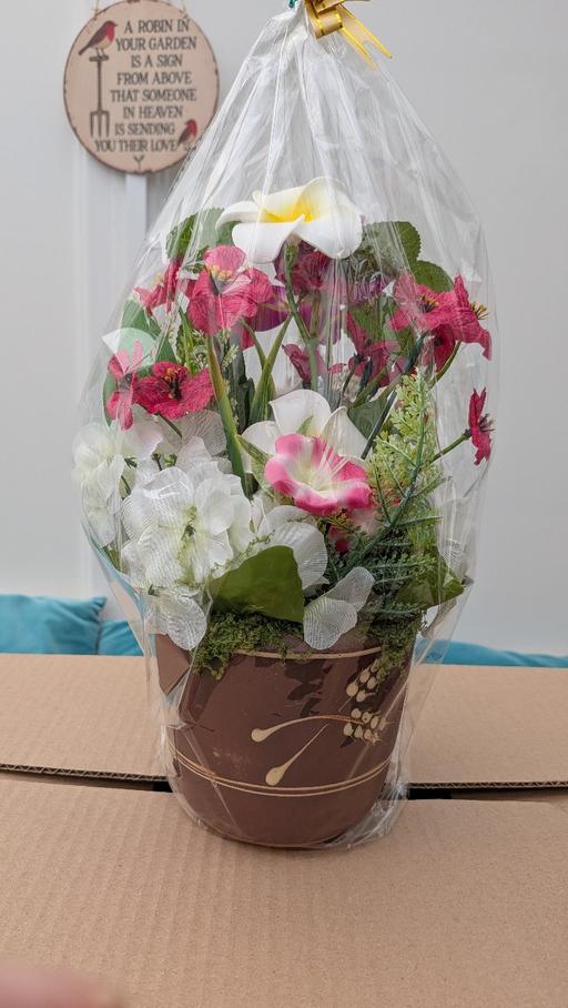  — artificial flowers