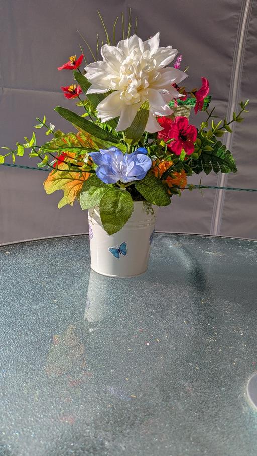  — artificial flowers