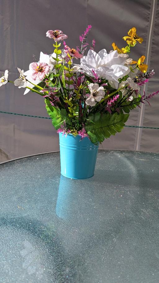  — artificial flowers