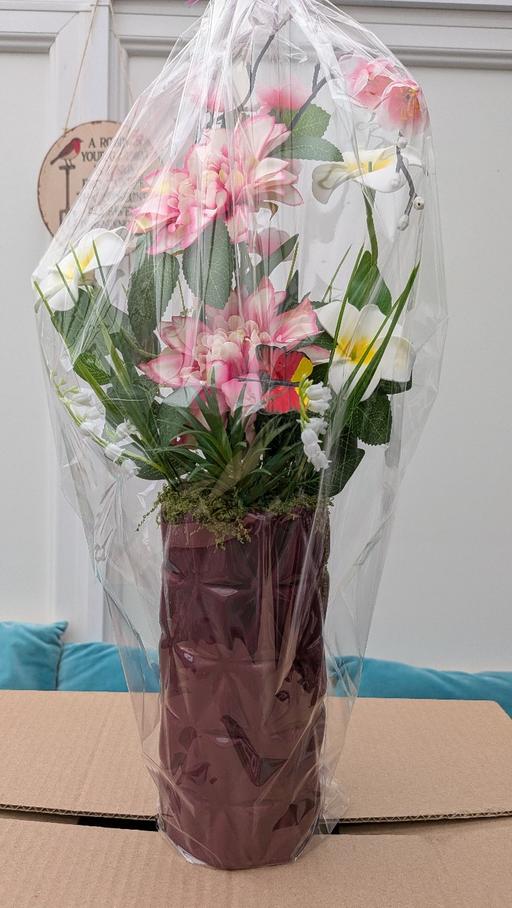  — artificial flowers