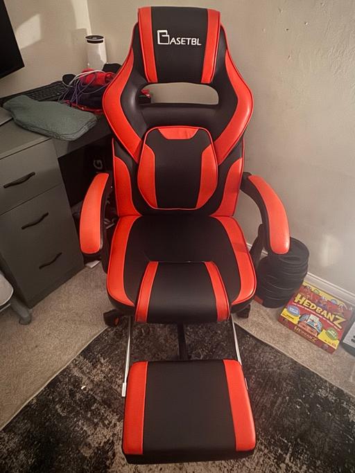  — Red and black reclining gaming chair