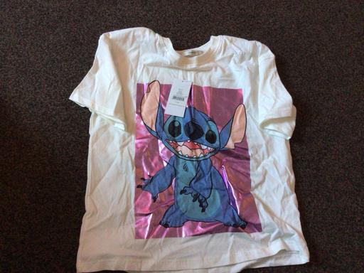  — New age 10/11 T-shirt