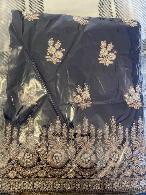  — Unstitched suit