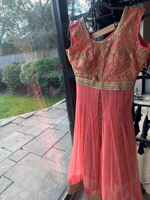  — Asian outfit