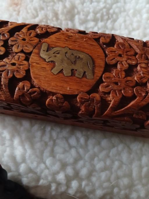  — carved box about 5 ins long