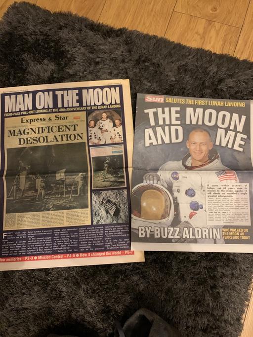  — Commemorative newspapers man on the moon