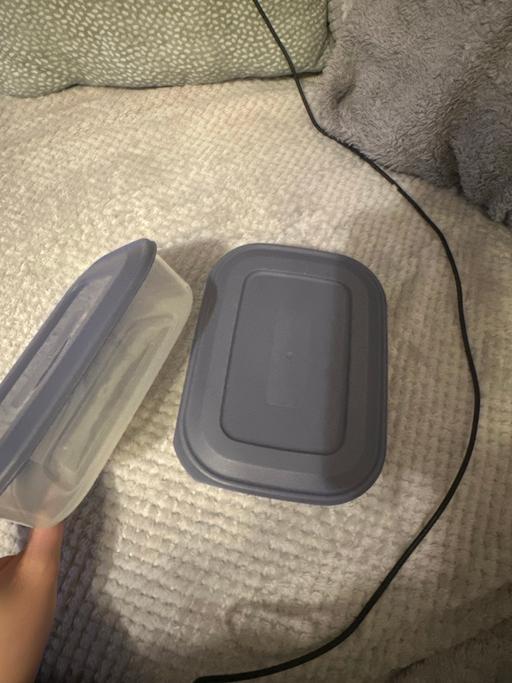  — 2 Tupperware containers