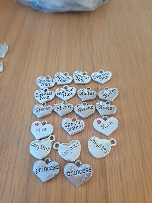  — 40 mixed silver heart Family charms