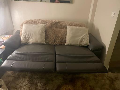  — 3 seater grey electric reclining sofa