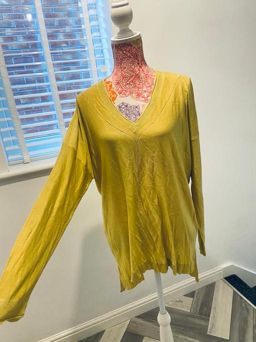  — (20) NEXT SWEATER