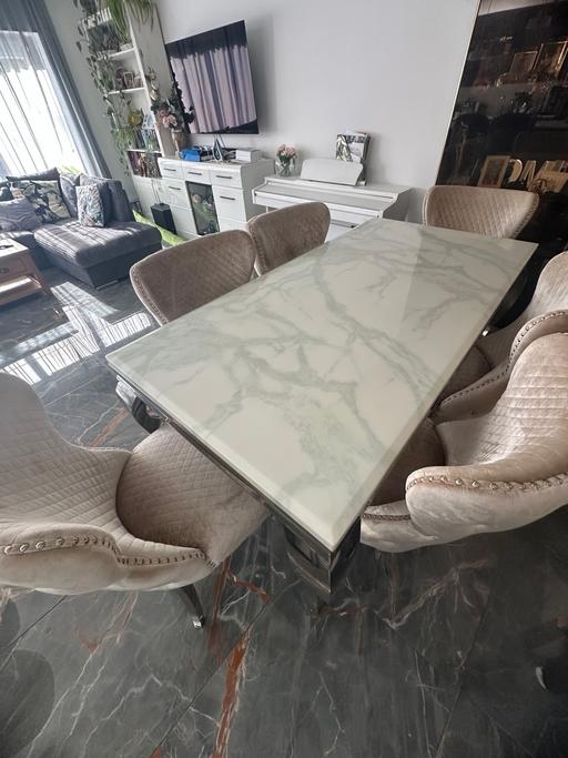  — Dinning table and 6 chairs