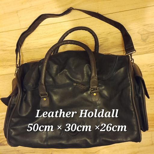  — LEATHER HOLDALL