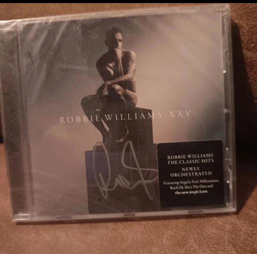  — Robbie Williams hand signed and sealed XXV CD