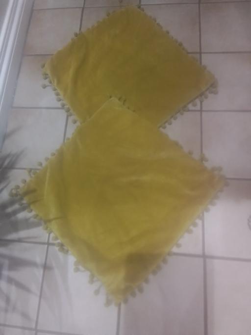  — TWO MUSTARD CUSHION COVERS