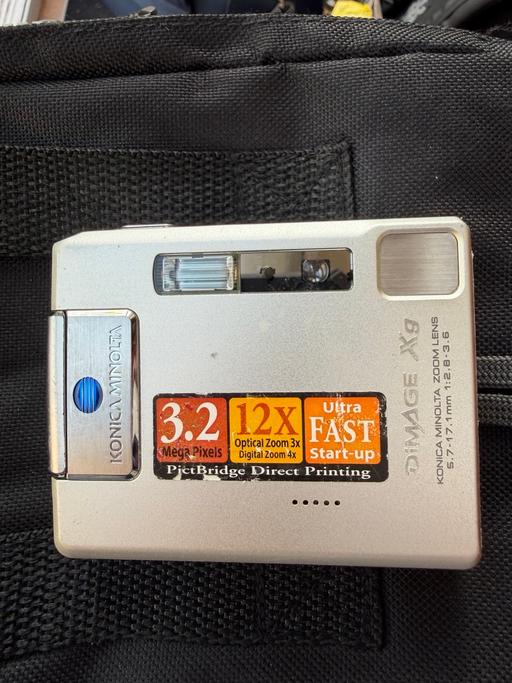  — Konica minolta compact digital camera