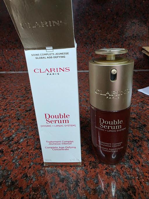  — Clarins Double Serum