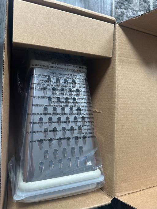  — Brand new 4 sided cheese grater