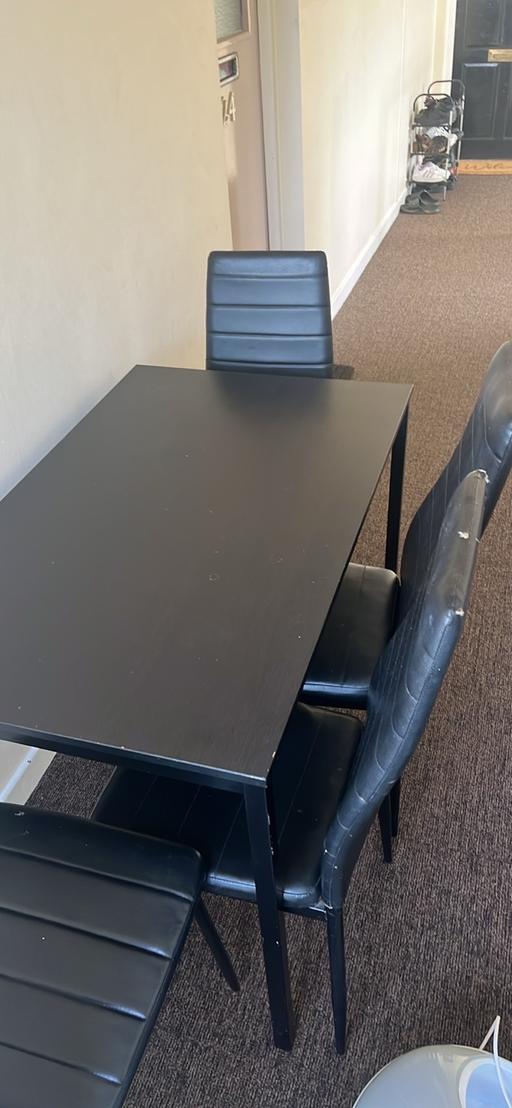  — Table and chairs
