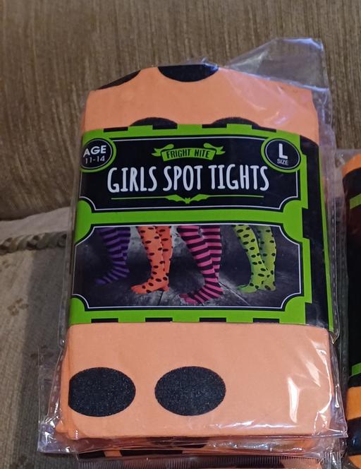  — Girls spotted tights. L. age 11-14. New