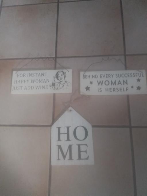  — THREE SIGNS
