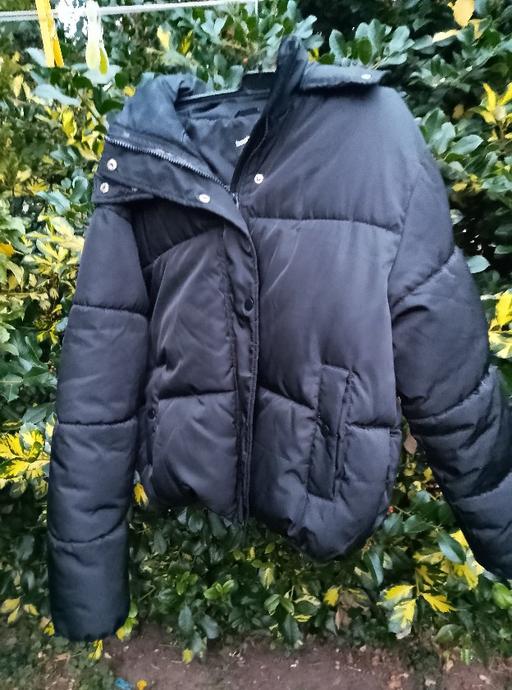  — Coat